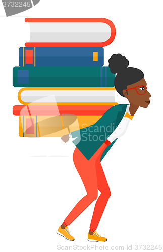 Image of Woman with pile of books.