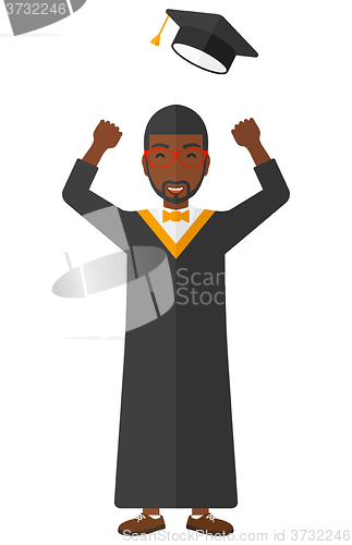 Image of Graduate throwing up his hat.