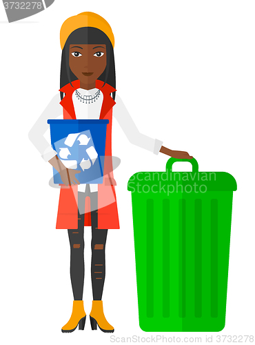 Image of Woman with recycle bins.