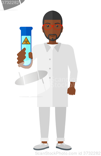 Image of Laboratory assistant with test tube.