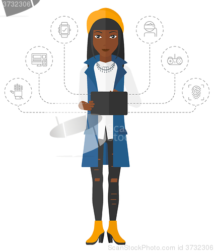 Image of Woman holding tablet computer.