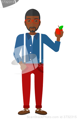 Image of Man holding apple.