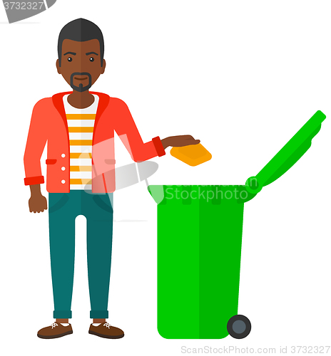 Image of Man throwing trash.