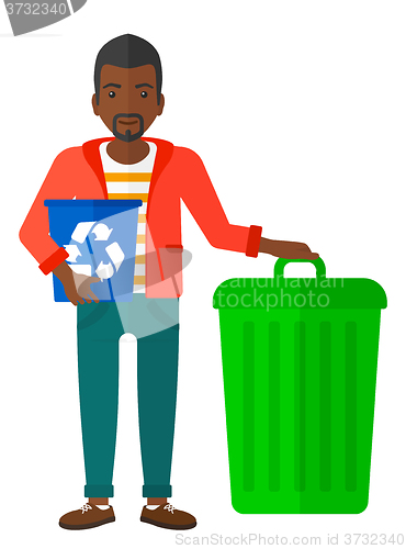 Image of Man with recycle bins.