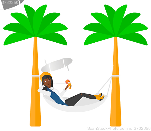 Image of Woman chilling in hammock.