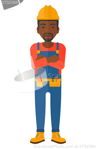 Image of Friendly builder with arms crossed.
