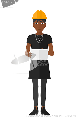 Image of Woman holding tablet.