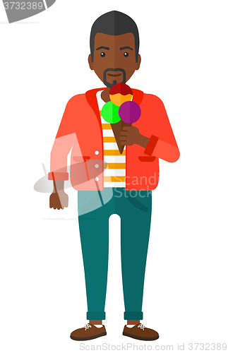 Image of Man holding icecream.