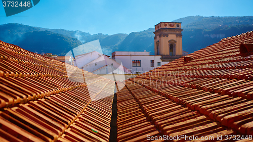 Image of view of typical vintage house with tile roof