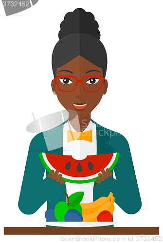 Image of Woman eating watermelon.