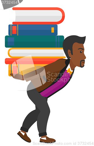 Image of Man with pile of books.