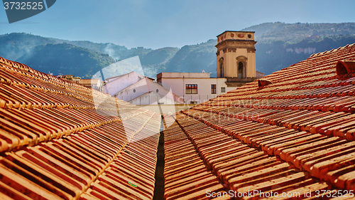 Image of view of typical vintage house with tile roof