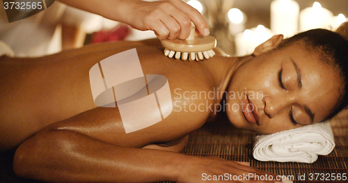 Image of Woman Enjoying A Massage Her Back
