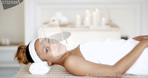 Image of Woman Is Resting On Spa Bed