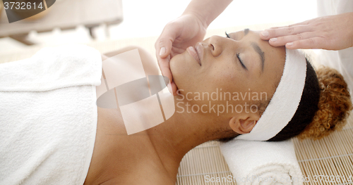 Image of Woman Getting A Face Massage