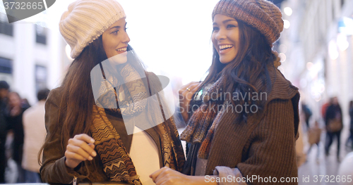 Image of Two stylish young women in winter fashion