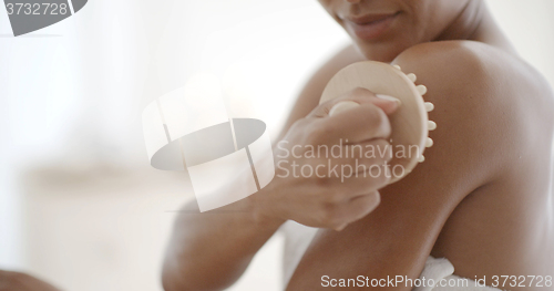 Image of Woman Massaging Hand In Spa