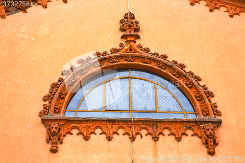 Image of  incision   in house  window   red orange