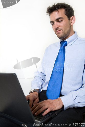 Image of Man working on laptop