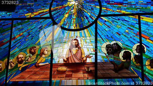 Image of  Stained glass window depicting Jesus and the twelve