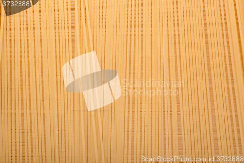 Image of Uncooked spaghetti background