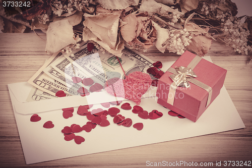 Image of valentine concept with hearts, dry roses and