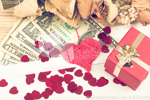 Image of valentine concept with hearts, dry roses and