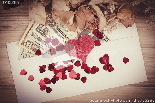 Image of valentine concept with hearts, dry roses and