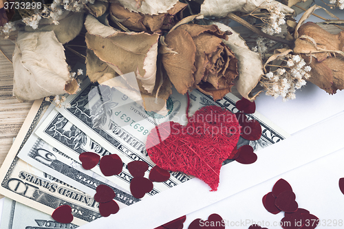 Image of valentine concept with hearts, dry roses and