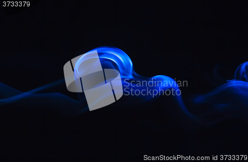 Image of Dark blue smoke on a black background