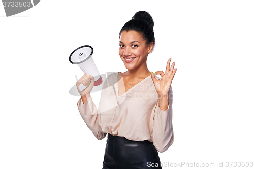 Image of Woman hold loudspeaker