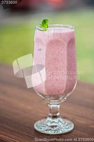 Image of Strawberry smoothie on  table