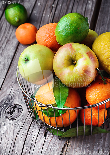 Image of Apple,mandarin and lime