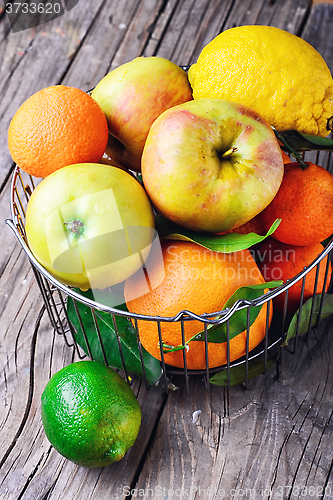 Image of Apple,mandarin and lime