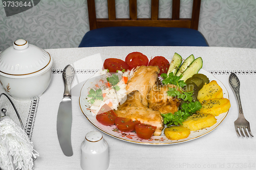 Image of Baked fish and vegetables . The view from the top.