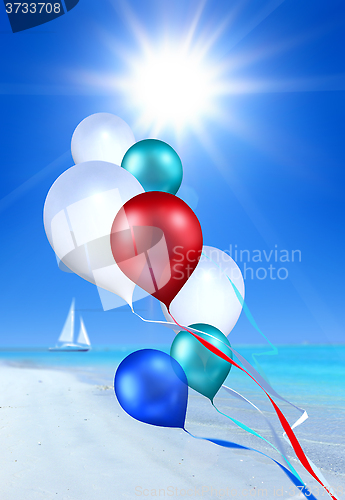 Image of soaring balloons over sea