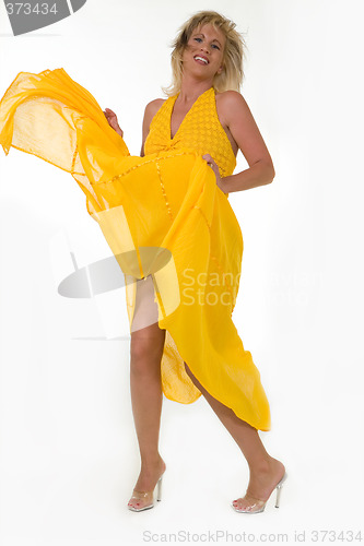 Image of Blowing yellow dress