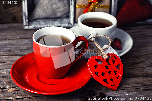 Image of Cup decorated with wooden hearts
