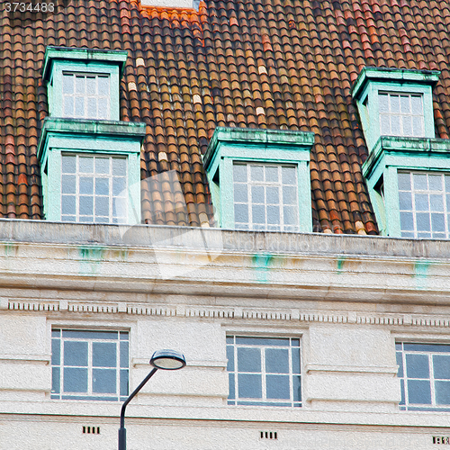 Image of old windon in england london brick roof tile