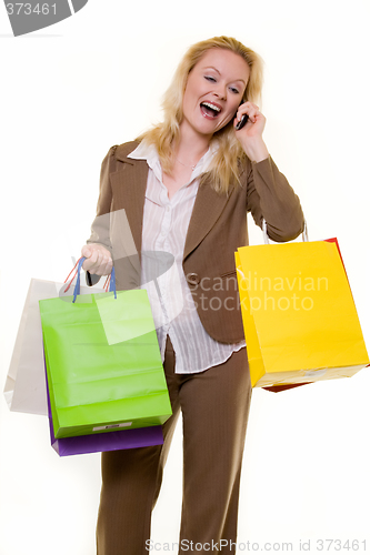 Image of Excited shopper on the phone