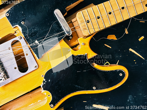 Image of Old broken electric guitar