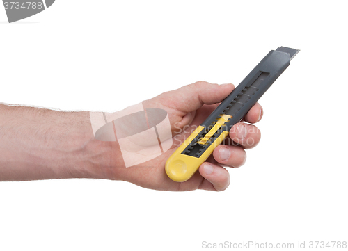 Image of Hand with cutter isolated