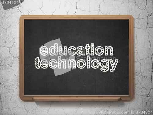 Image of Learning concept: Education Technology on chalkboard background