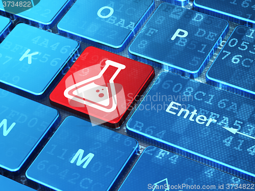 Image of Science concept: Flask on computer keyboard background