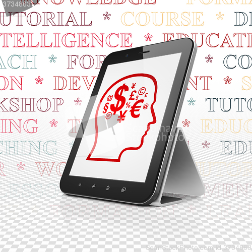 Image of Learning concept: Tablet Computer with Head With Finance Symbol on display