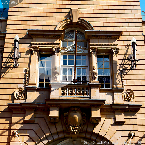 Image of old windon in england london brick and glass the wall 