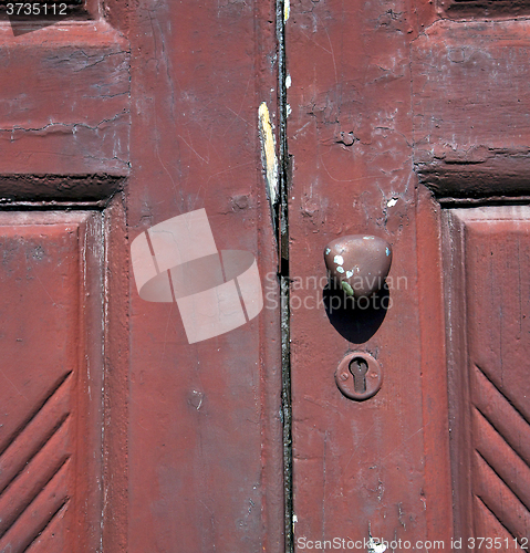 Image of  brass brown knocker and wood   vinago  varese italy