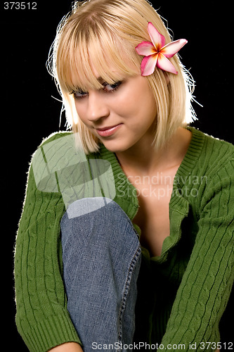 Image of Woman with flower in hair