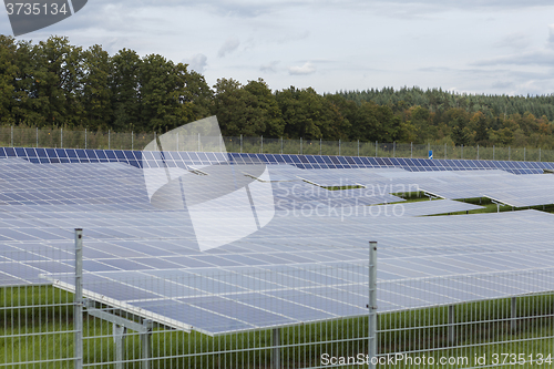 Image of Field with blue siliciom solar cells alternative energy