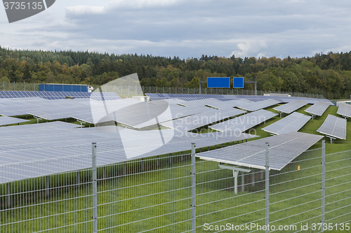 Image of Field with blue siliciom solar cells alternative energy